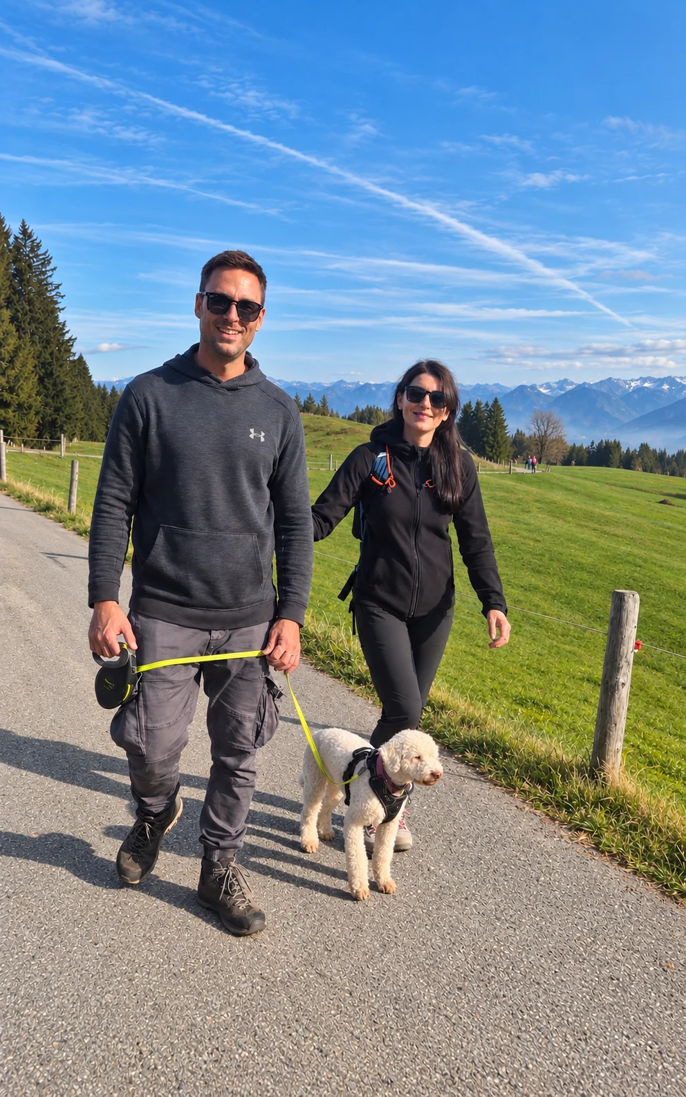Ronny and Mariana Grossenbacher with their dog Aya in the Bernese Oberland, shown in full